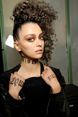 Jean Paul Gaultier took tattoo fever up a notch by temporarily